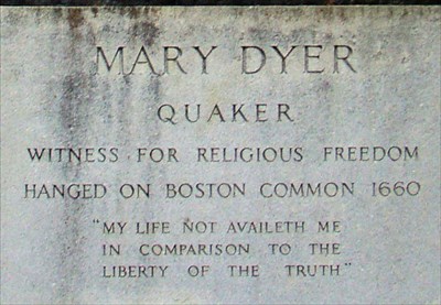 Wording at base of the statue