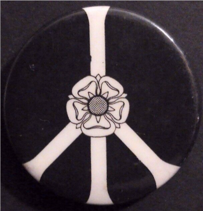 Rusted 1982 CND Badge