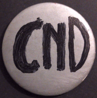 Rusted 1982 CND Badge