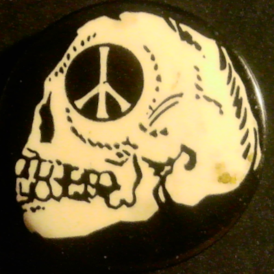 Rusted 1982 CND Badge