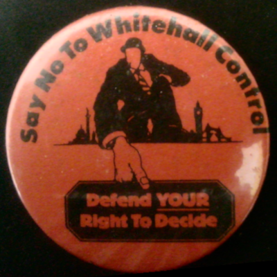 Rusted 1982 CND Badge