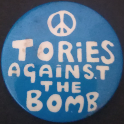 Rusted 1982 CND Badge