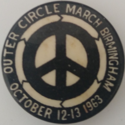 Rusted 1982 CND Badge