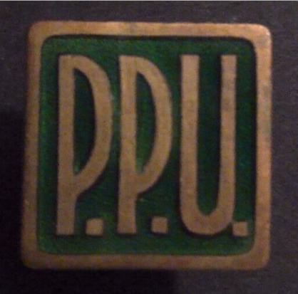 Rusted 1982 CND Badge