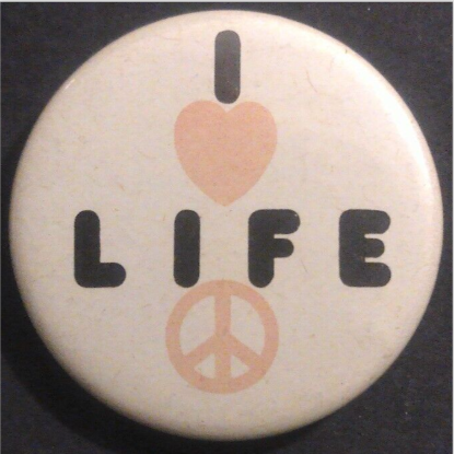 Rusted 1982 CND Badge