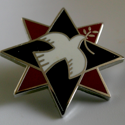 Rusted 1982 CND Badge