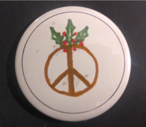Rusted 1982 CND Badge