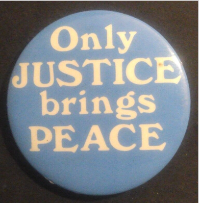 Rusted 1982 CND Badge