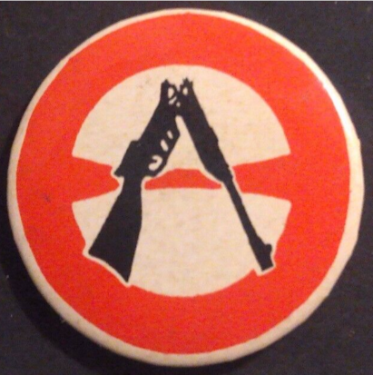 Rusted 1982 CND Badge